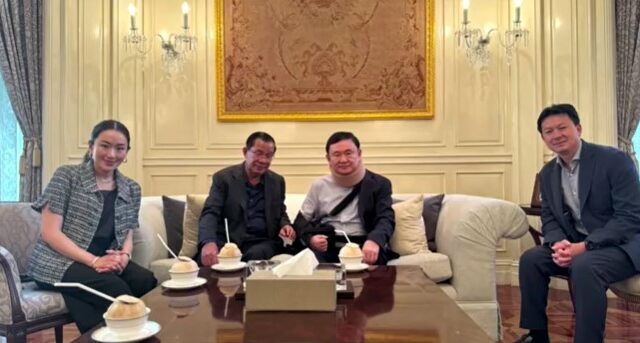 Hun Sen visits Taksin