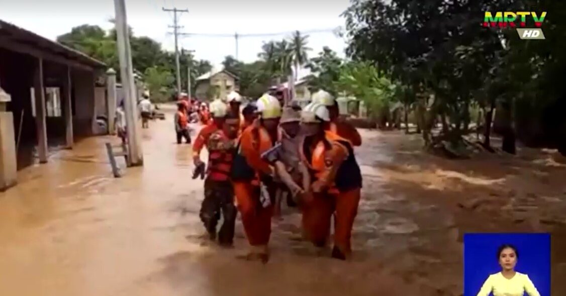 Myanmar rescuers evacuate people from flood area