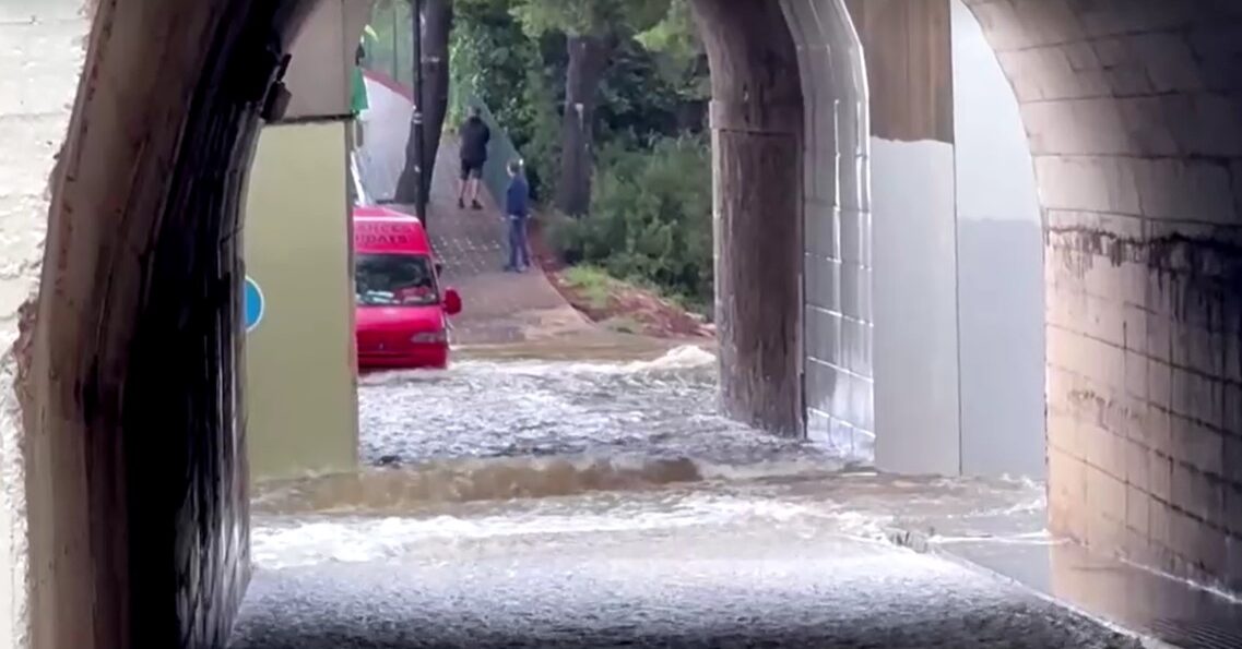 Heavy rains spark flash flooding in Spain's tunnel