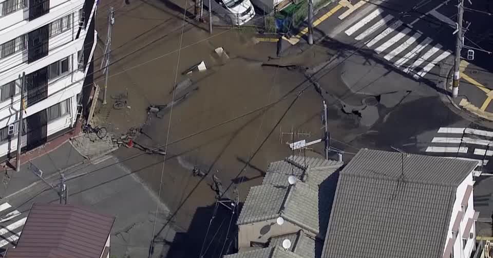 Giant sinkhole opens up in Hiroshima after underground pipe bursts