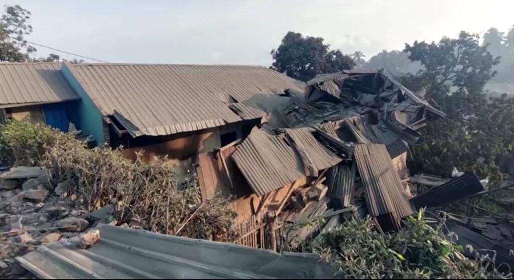 Indonesia's Mount Lewotobi Laki-Laki volcano erupts damaging house