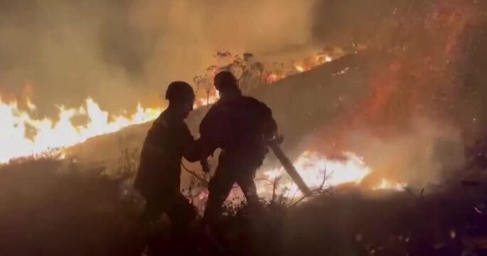 firefighters handle wild fire