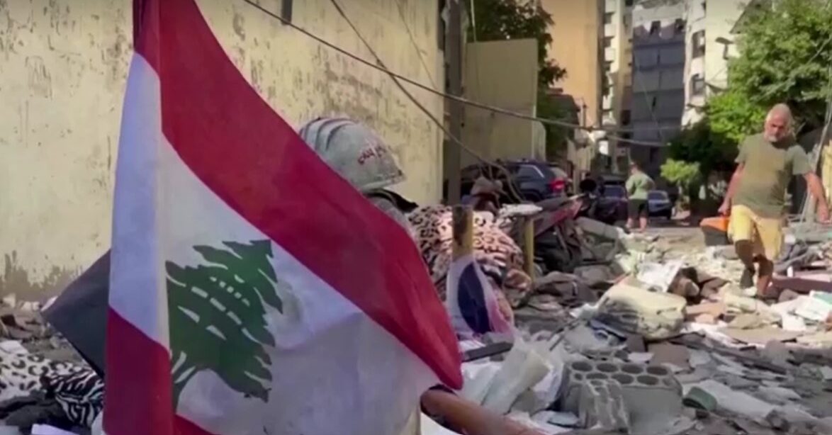 Lebanon flag among debris