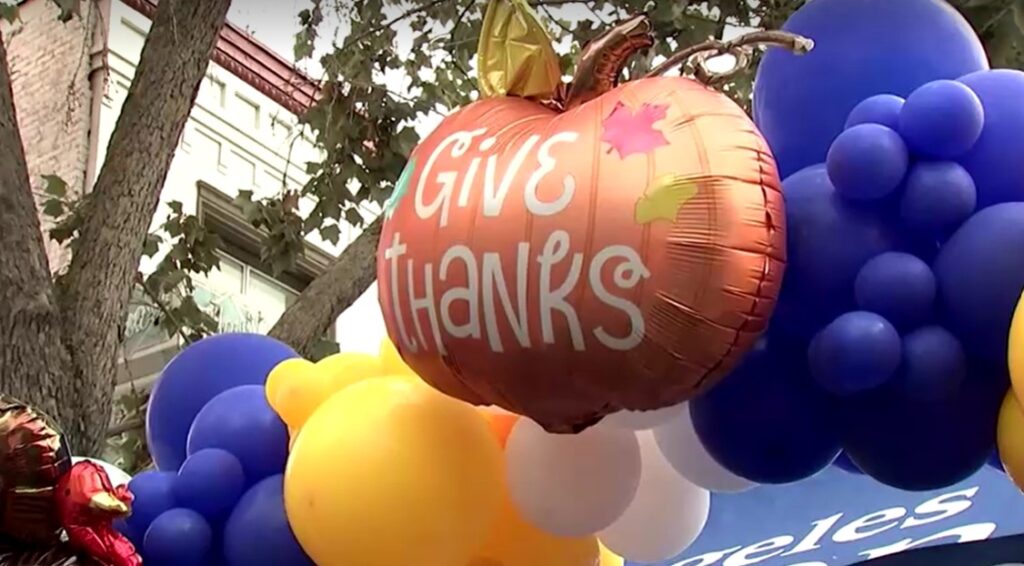 Celebrities dish out Thanksgiving food for the homeless on LA's Skid Row 