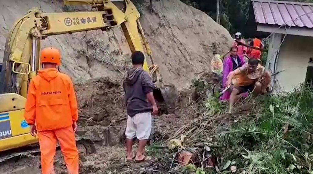 Landslides in Indonesia's Sumatra kill at least 27, rescuers search for missing