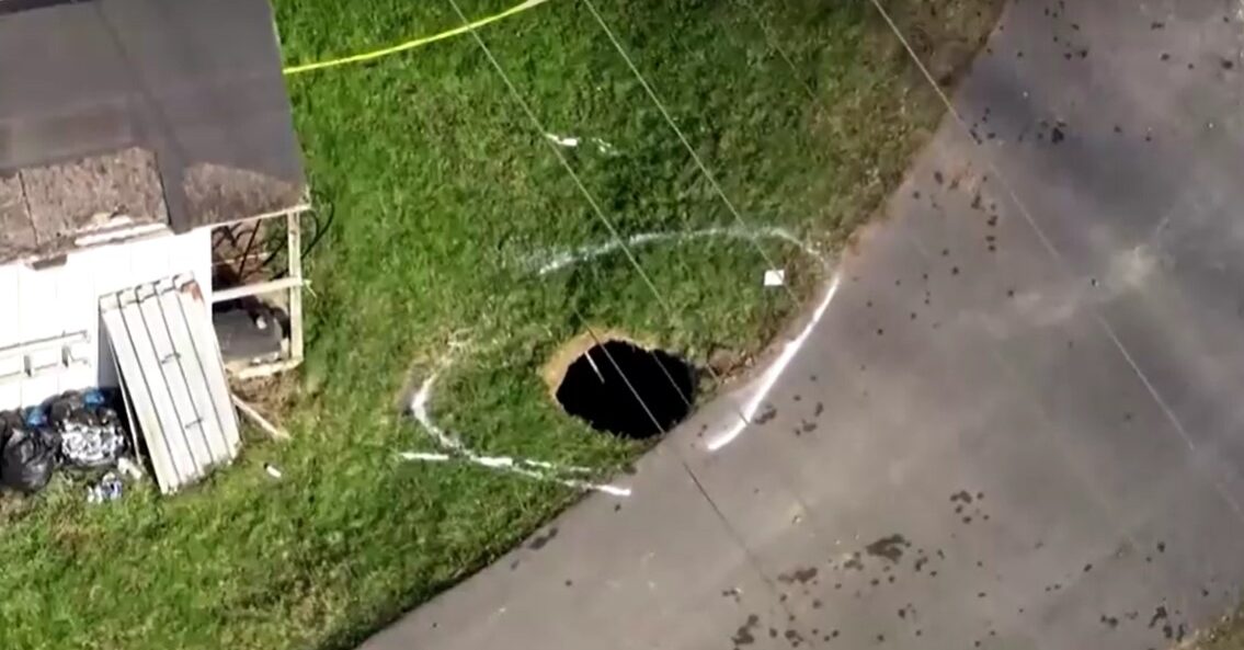 Search underway for woman who may have fallen into sinkhole while searching for her cat