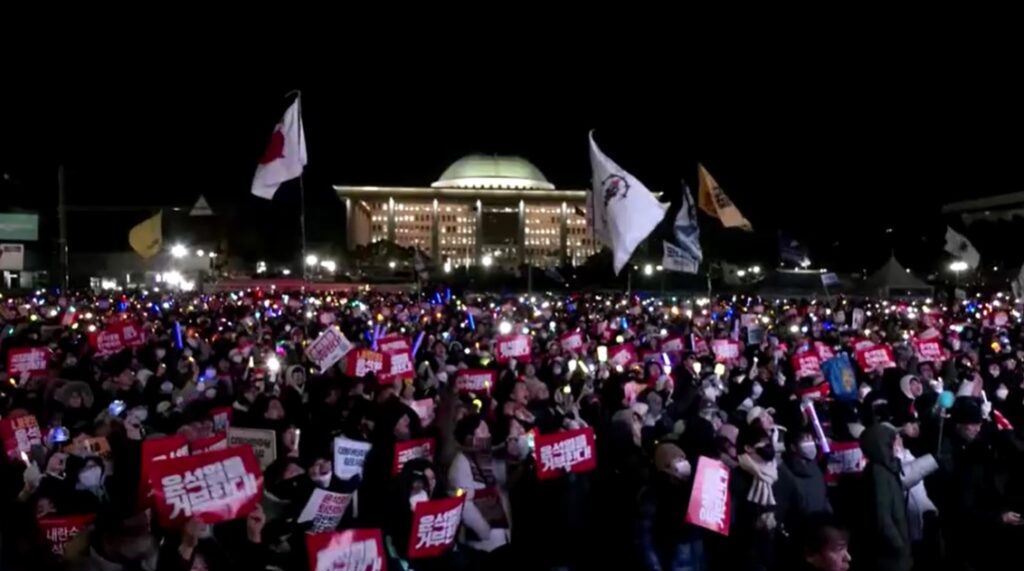 light sticks fire up impeachment protests in front of South Korea Parliament