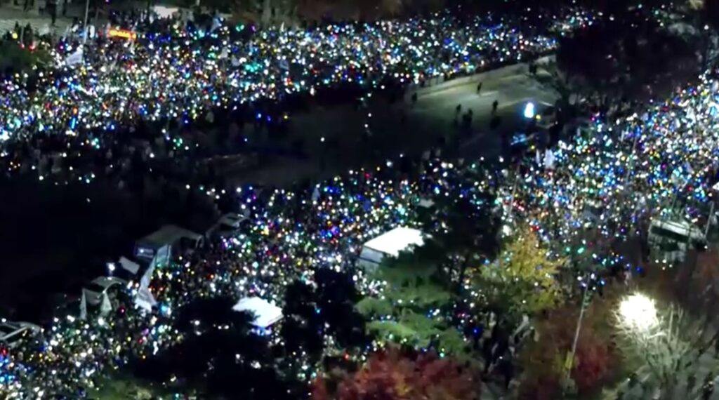 light sticks fire up impeachment protests in South Korea longshot