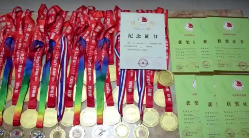 Chinese 71-year-old sprinter's medals and certificates