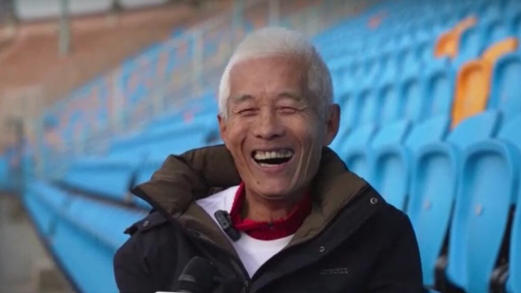 Chinese 71-year-old sprinter smiling