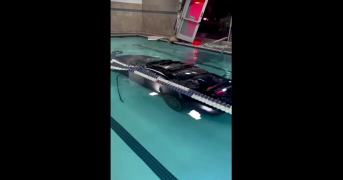 car plunges into fitness center pool