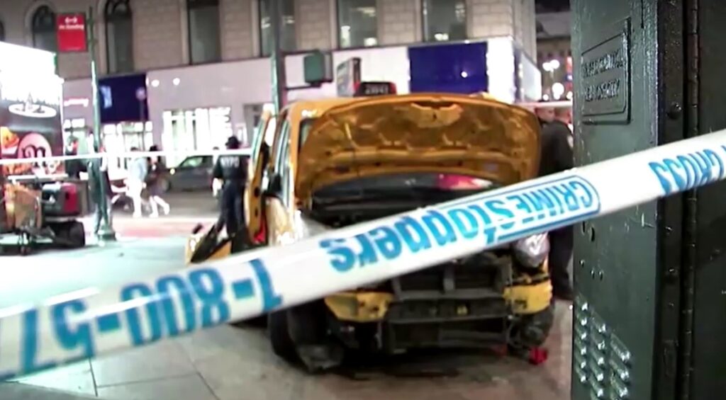 New York taxi jumps sidewalk outside Macy's on Christmas Day