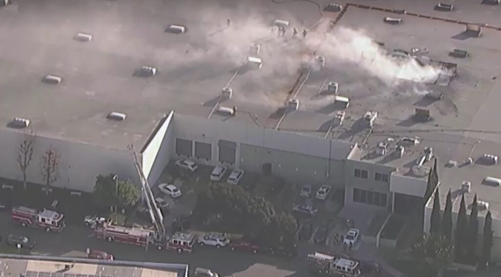 plane crashes into warehouse in California