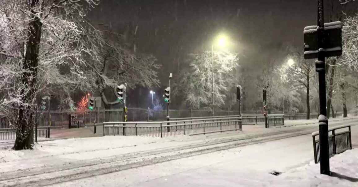 Heavy snowfall and rain sweep across the UK