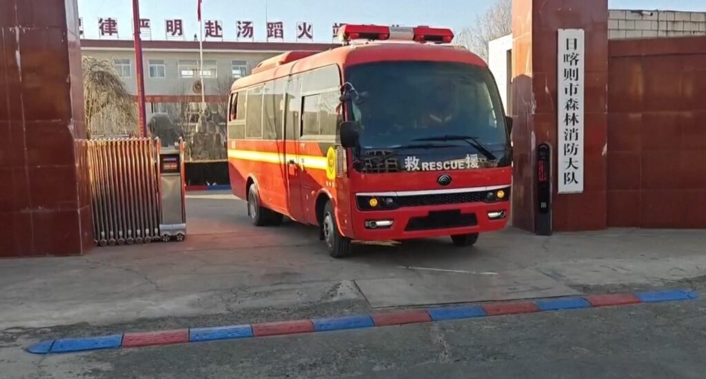 Chinese rescuers in rescue car