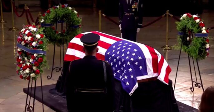 Jimmy Carter's flag-draped coffin under the Capitol dome