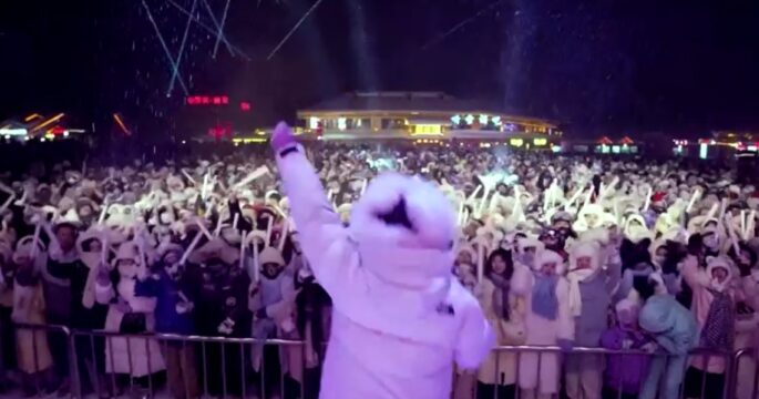 people dance to disco music in falling snow