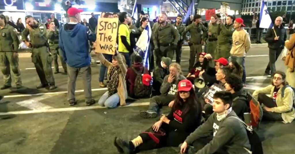 Scuffles erupt between Israeli anti-war protesters and police in Tel Aviv