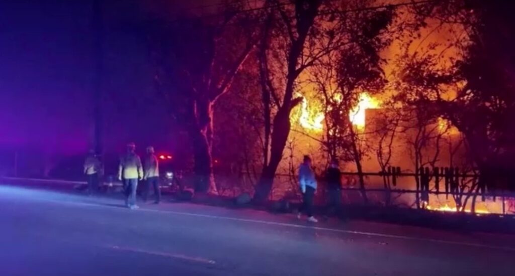 fire bursting from LA wildfire