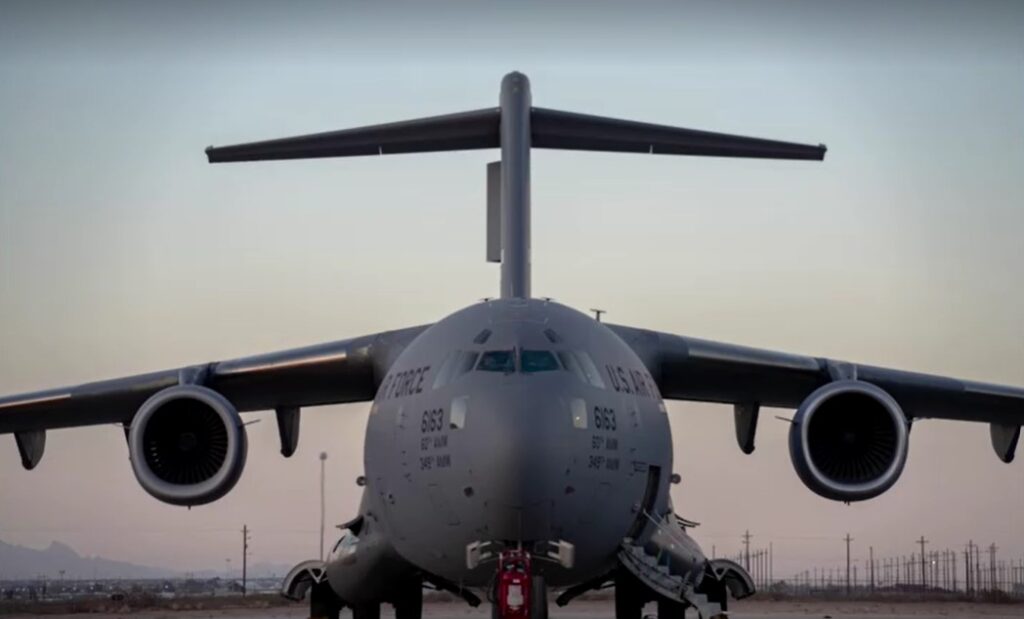 Undocumented migrants boarded onto U.S. military planes for deportation flights