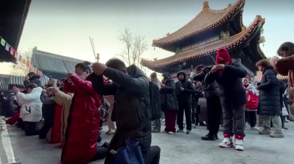 Beijing residents usher in the Year of the Snake with prayers at Lama Temple