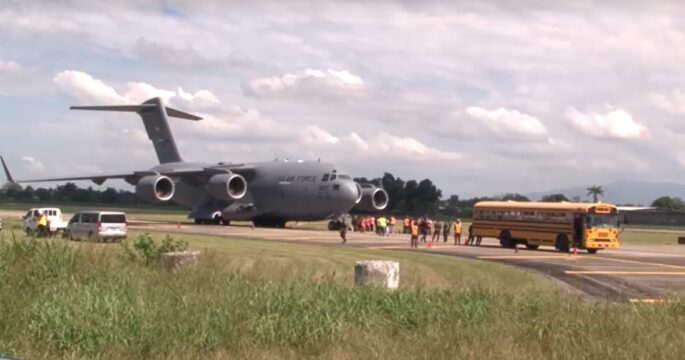 Two US military aircraft carrying deported migrants land in Honduras