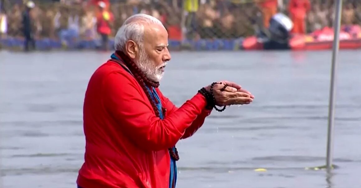 Modi takes holy dip, offers prayers at Maha Kumbh