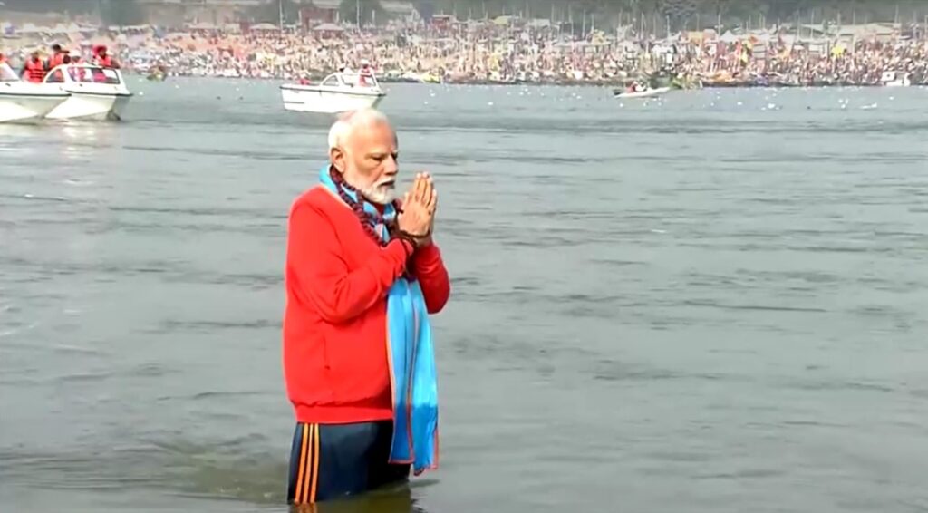 Modi takes holy dip, offers prayers at Maha Kumbh