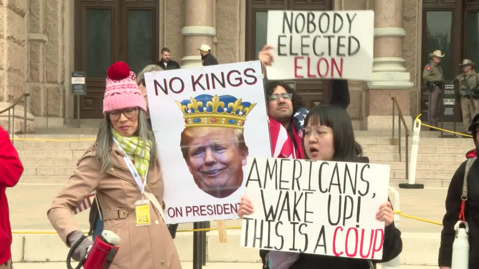 People in Austin gather to protest Trump and Musk