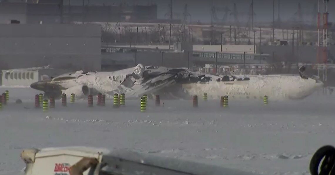 Investigators examine wreckage of passenger jet crash in Toronto