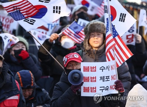 Supporters of impeached President Yoon Suk Yeol near the Seoul Central District Court