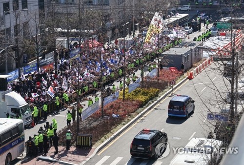 Convoy carrying impeached President Yoon Suk Yeol from the Seoul Central District Court to heads to the Constitutional Court