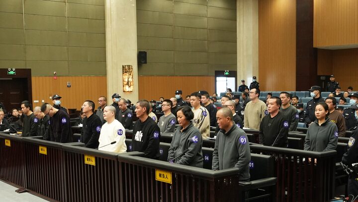 scammers brought to Wenzhou court in China