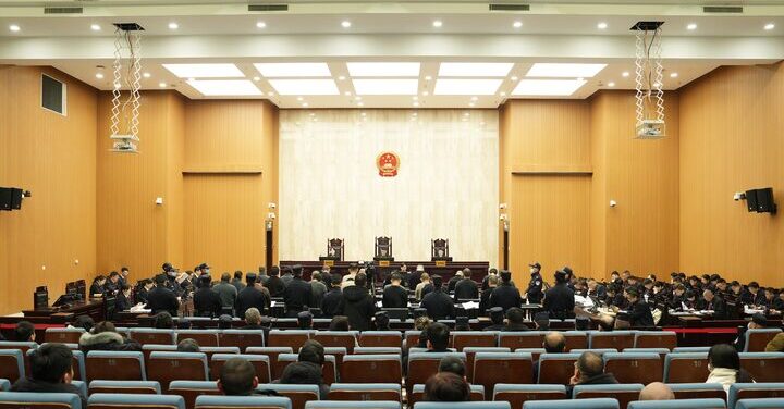 scammers brought to Wenzhou court in China