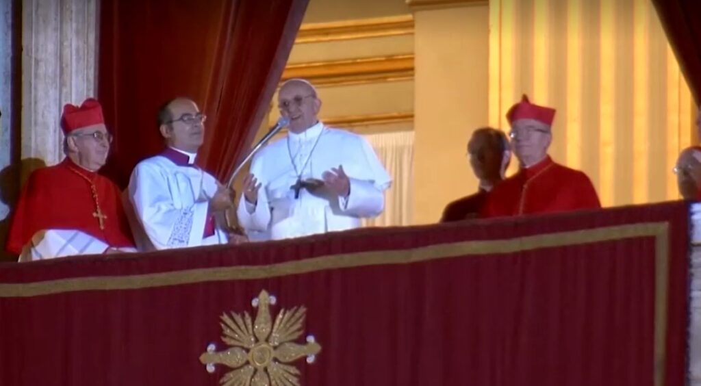 Newly elected Pope Francis arriving on balcony of St. Peter's basilica on March 13,2013