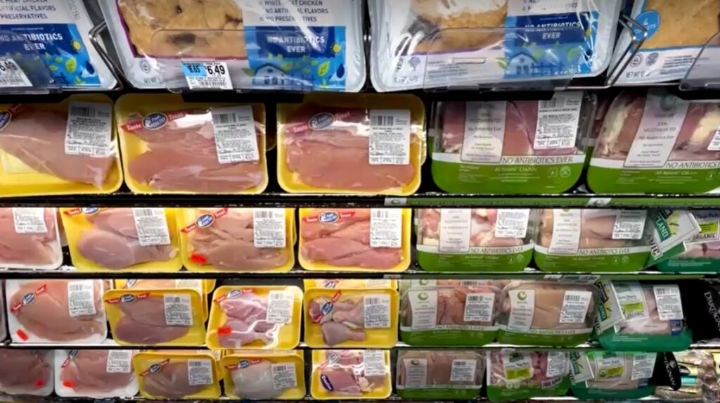 packs of processed chicken shown in supermarket