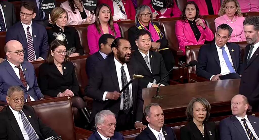 Democratic lawmaker removed from Trump speech to Congress