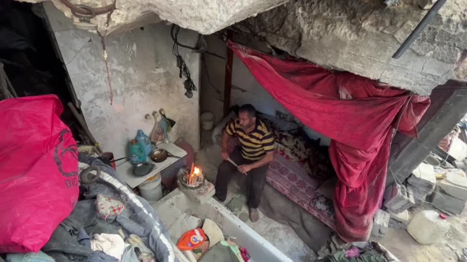 Palestinian living in destroyed home in Jabalia