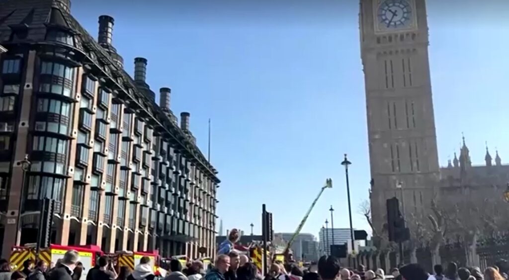 Protester climbs London's Big Ben with Palestinian flag