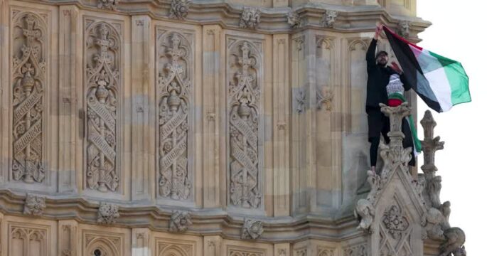 Protester climbs London's Big Ben with Palestinian flag