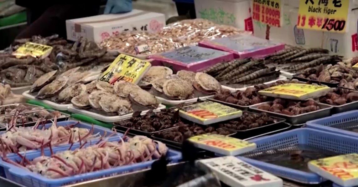 seafood stall with prices in Japan market