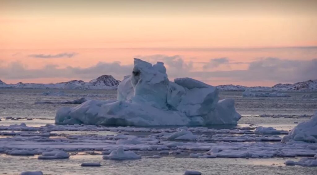 iceberg in sunset