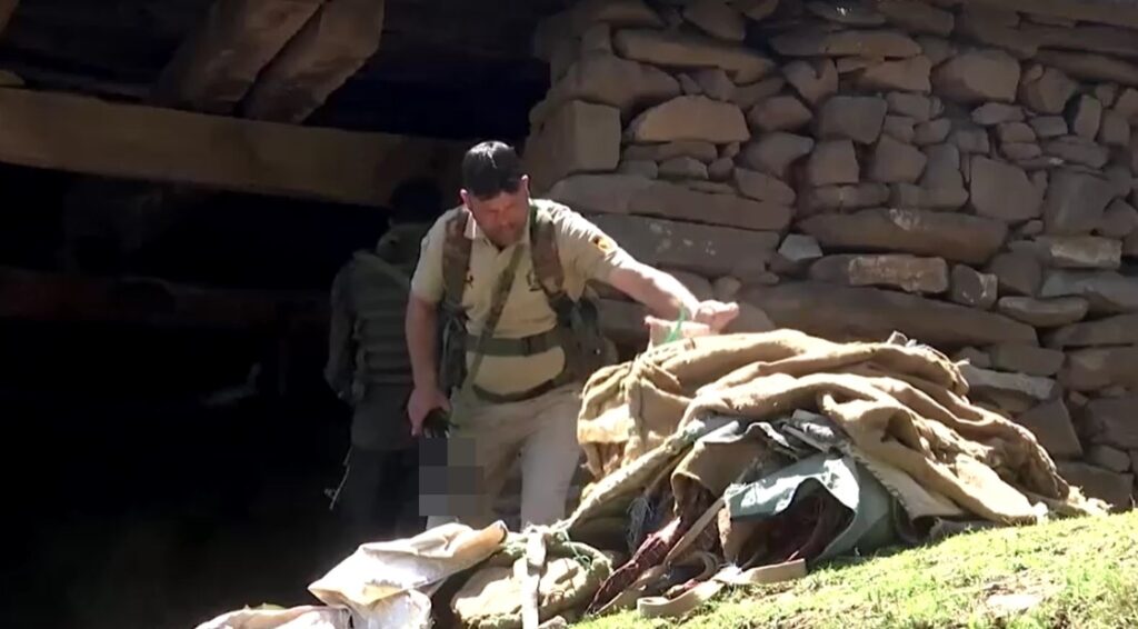 officer searches house in India's Jammu-Kashmir