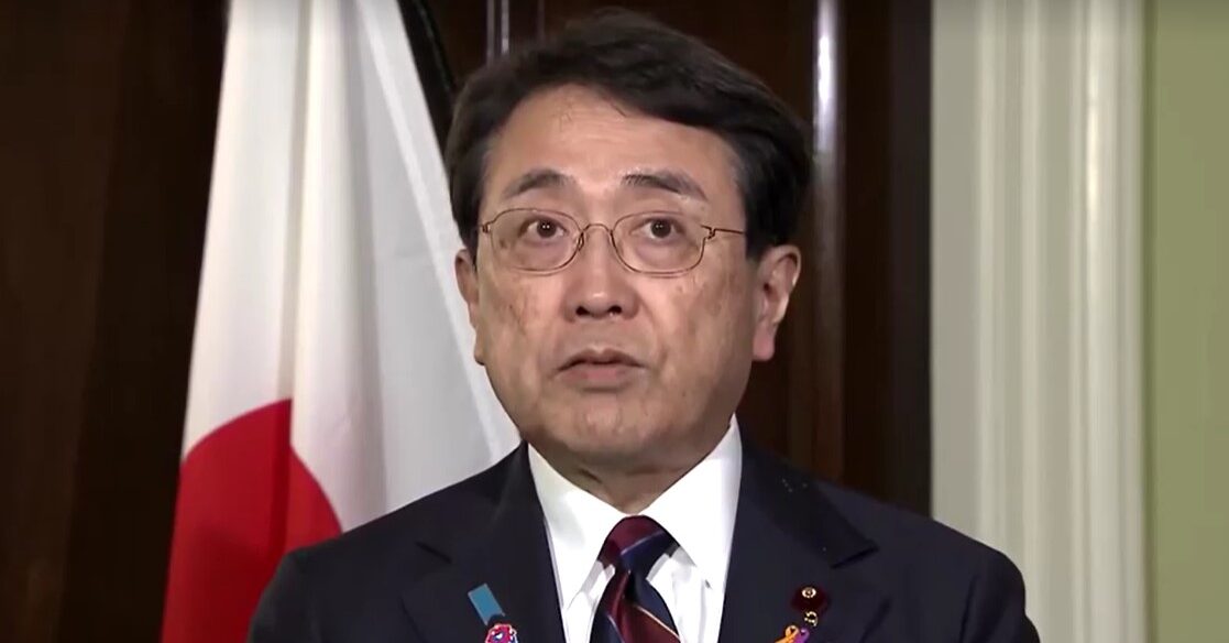 Japanese trade negotiator, Ryosei Akazawa, speaking to reporters