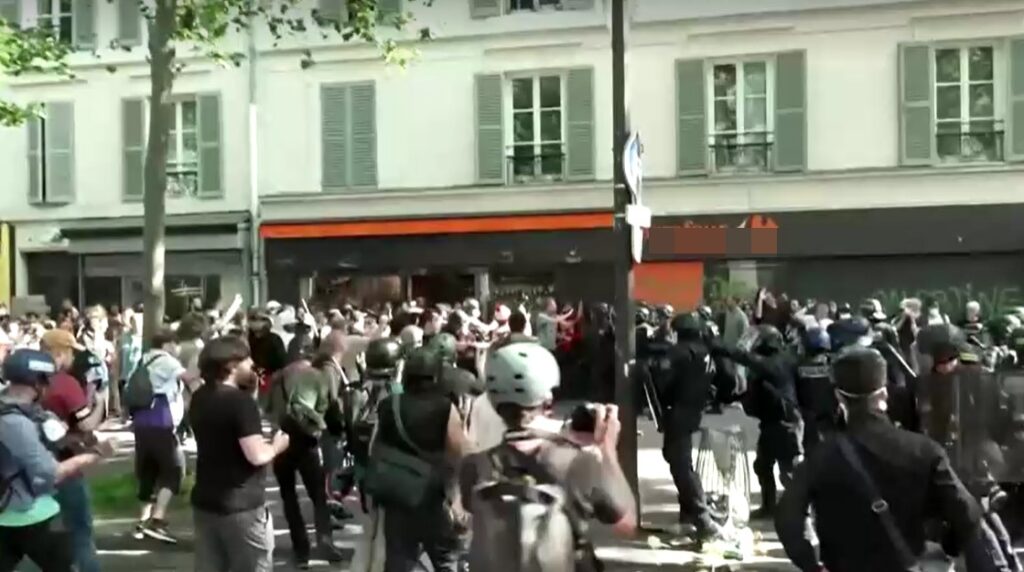 Protesters and police clash at May Day protest in Paris