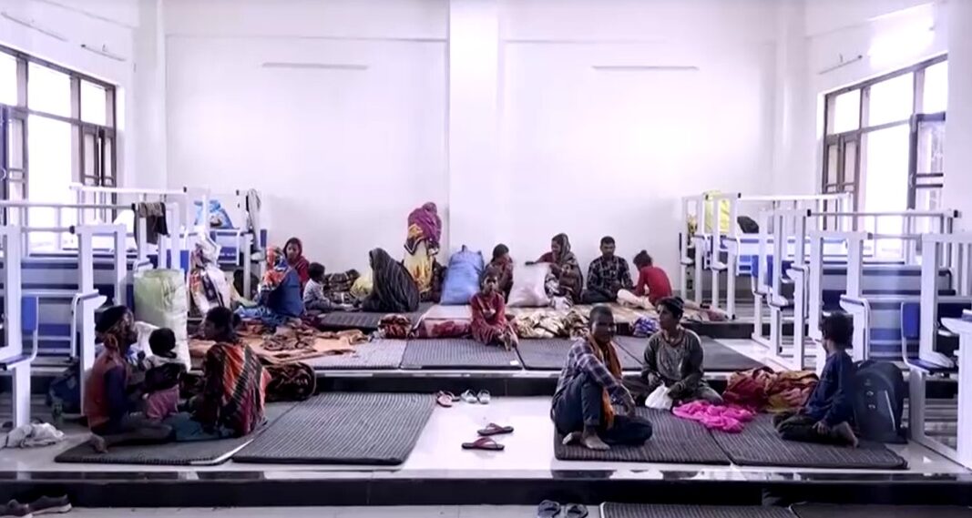 Fearful Indian villagers find refuge in shelter after evacuation