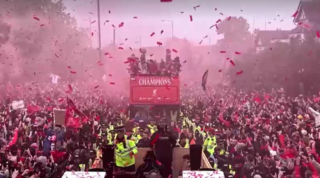Liverpool players and fans celebrate Premier League title