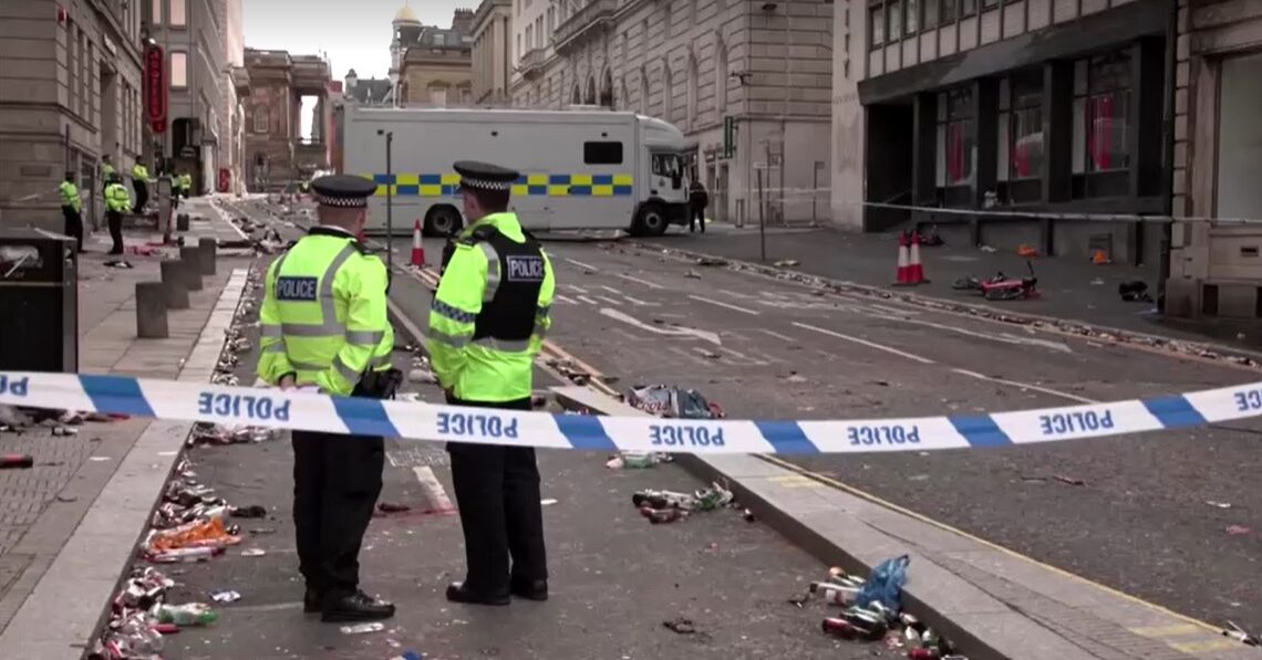 Police at scene morning after car plows into fans at Liverpool parade