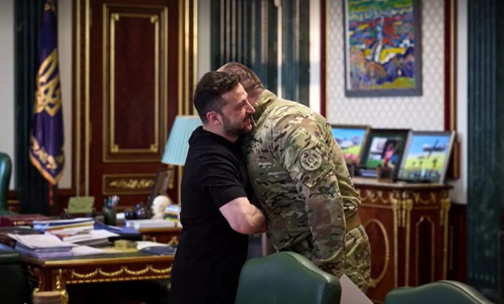 Ukraine’s Zelenskiy hugs Vasyl Maliuk, Chief of Security Service of Ukraine