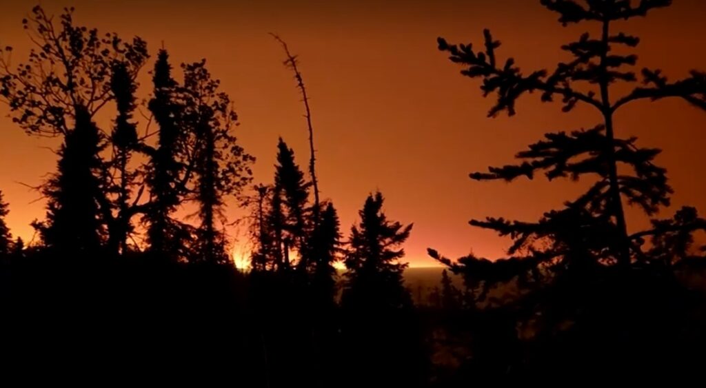 Wildfires paint skies orange in parts of Canada